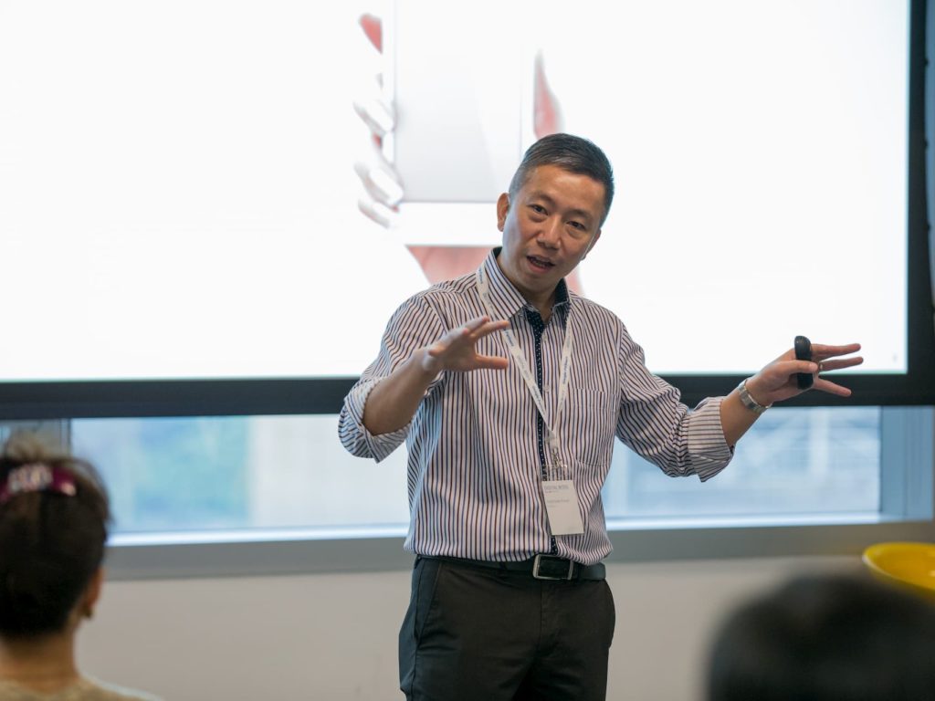 Matthew Kwan speaking at Google